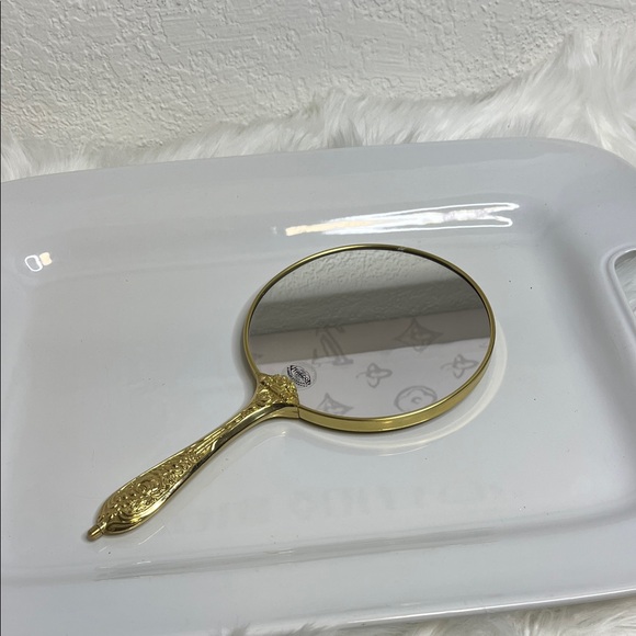 Frasco Other - Elegant Goldtone Handheld Vanity Mirror